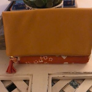 Floral and tan fold over zippered clutch